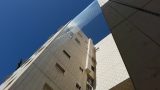 רשת שקופה להרחקת יונים מבניין בתל אביב_1